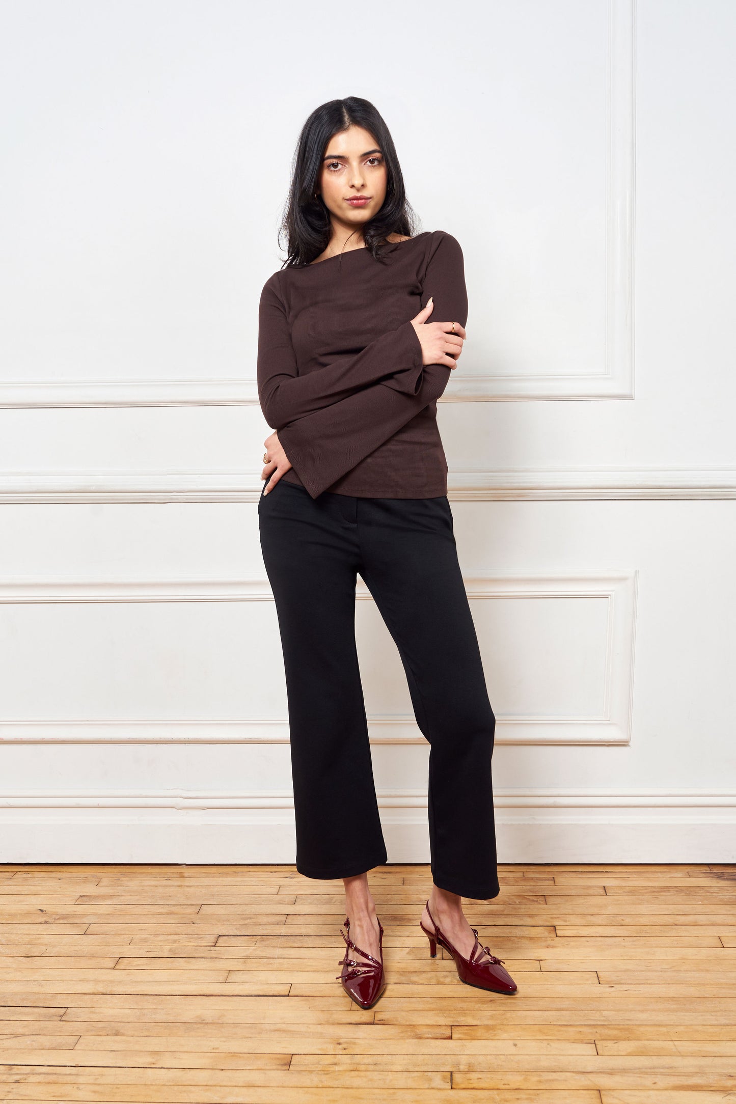 Classic black crop flare pant, made of ponte, 25.5" inseam, 2 fully functional front pockets w/invisible zippers, hidden front zipper, hook & bar closure, matches with issy;s classic black blazer.