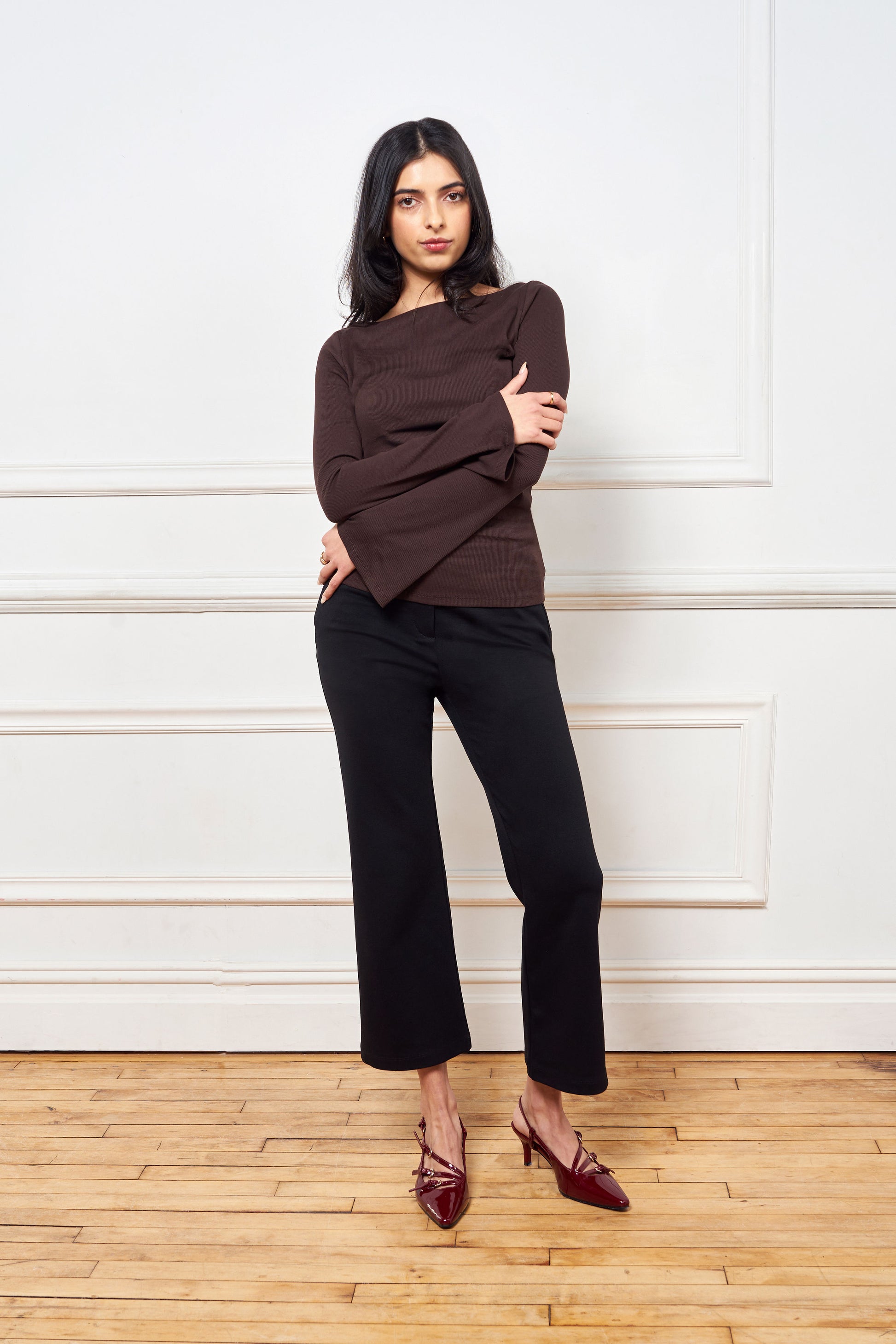 Classic black crop flare pant, made of ponte, 25.5" inseam, 2 fully functional front pockets w/invisible zippers, hidden front zipper, hook & bar closure, matches with issy;s classic black blazer.