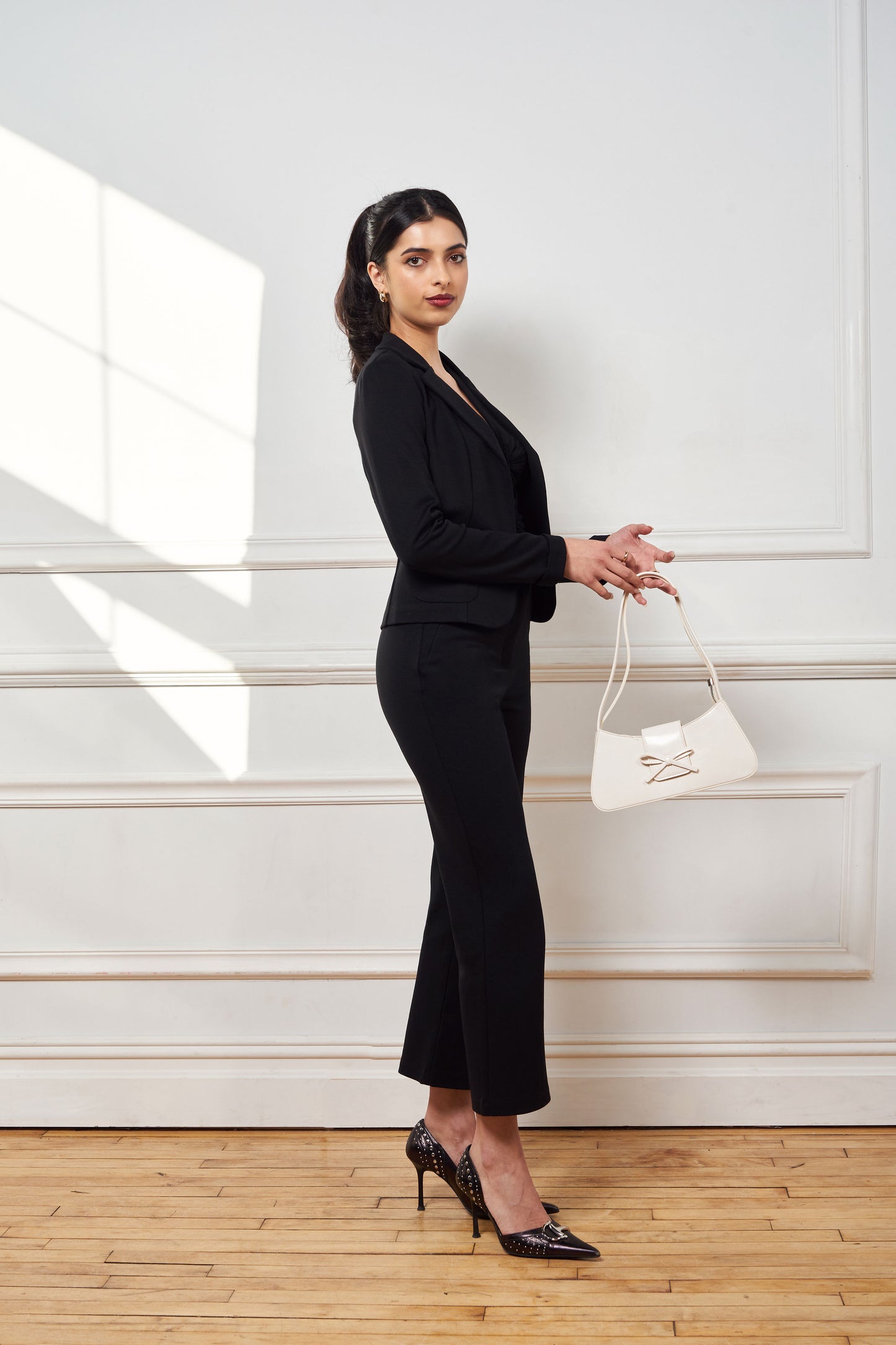 classic black blazer, made of ponte, princess seam, open front, 2 small front pockets, small wrist cuff, matches with issy's classic pencil skirt and issy's classic crop flare pant.