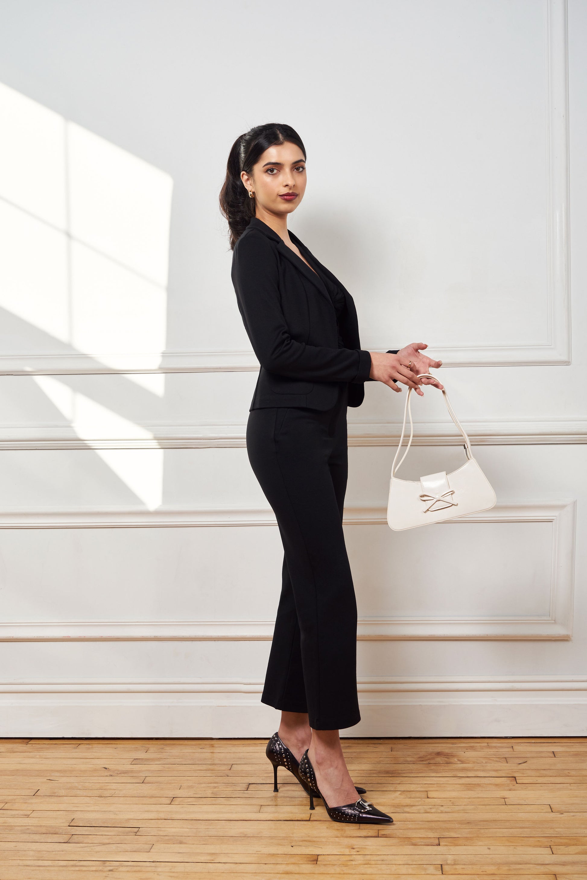 classic black blazer, made of ponte, princess seam, open front, 2 small front pockets, small wrist cuff, matches with issy's classic pencil skirt and issy's classic crop flare pant.